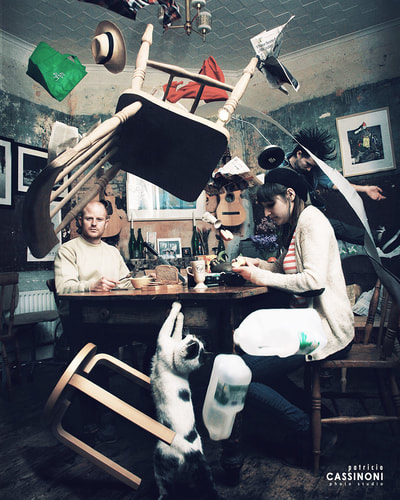 flying objects, chair, cat, bottles, papers in a kitchen set as a visual content for a theatre company shoot in dublin